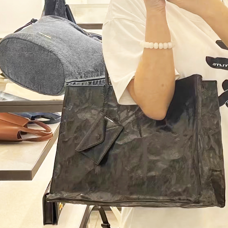 أكياس محفورة على ورق كرافت الك - مراجعة Luxury Bags Collection وسعره