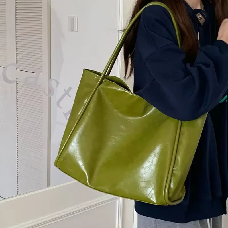 حقيبة يد محمولة ذات ملمس مميز  - مراجعة Luxury Bags Green وسعره